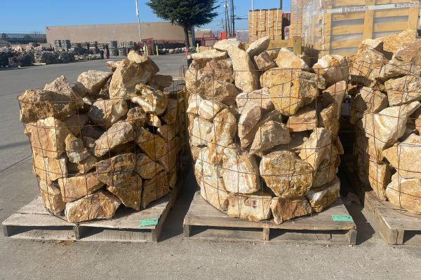 Onyx Boulders in a pallet. Brown and beige tones 